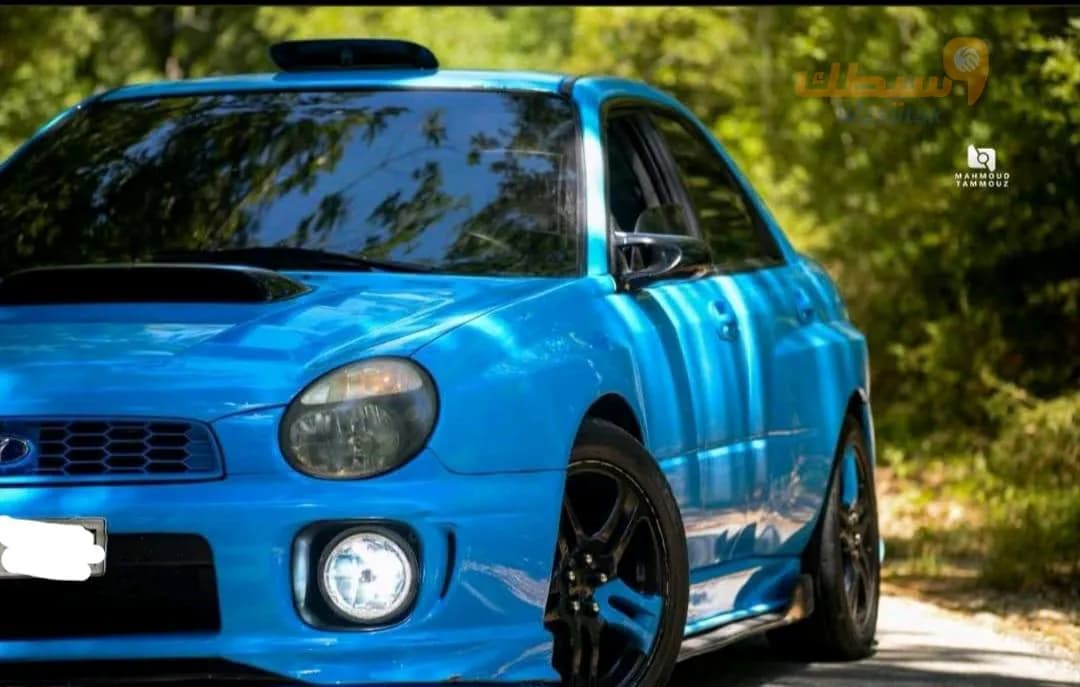 سوبارو امبريزا 2001 - 1